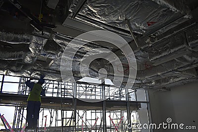 ducting work. duct Insulation. HVAC system in the construction site. air duct for air conditioning and ventilation systems. Editorial Stock Photo