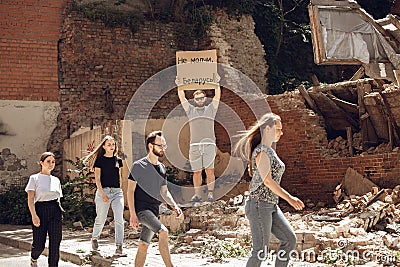 Dude with sign - man stands protesting things that annoy him Stock Photo