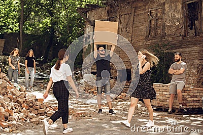 Dude with sign - man stands protesting things that annoy him Stock Photo