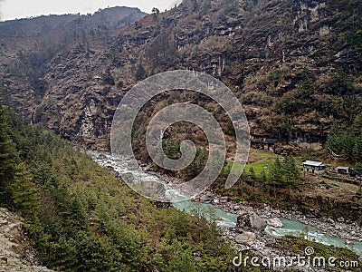 Dudh Koshi snow river in mountain valley in Nepal Stock Photo