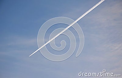 Due to the covid pandemic, planes stop flying. collapsing airlines. there are fewer and fewer such white lines above us. but the s Stock Photo