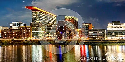 Duesseldorf Media Harbor at night, Germany - Dusseldorf Medienhafen Stock Photo