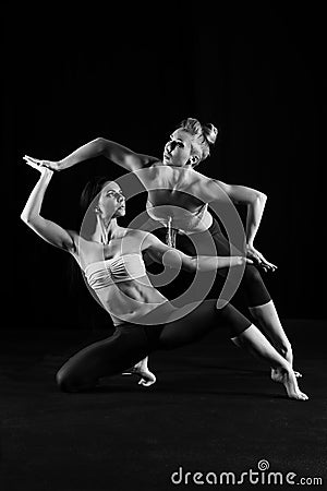 Duet of flexible female dancers Stock Photo