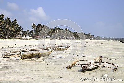 Dugouts on the beach in Zanzibar Stock Photo