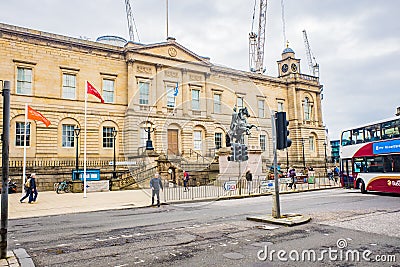 The Duke of Wellington Statue and bell tower of Balmoral Hotel in Edinburgh Editorial Stock Photo