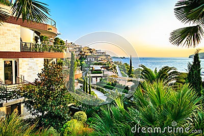 Dukley Gardens - elite real estate along Adriatic sea coast, has modern villas and luxury apartments. Rich resort on sunset, hotel Stock Photo