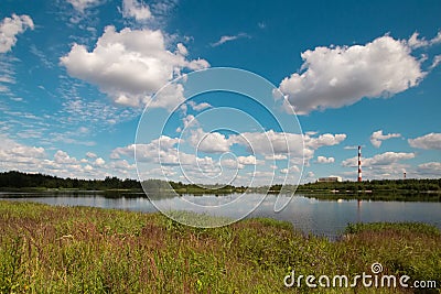 Dukora Belarus Minsk Region. Thermal energy electricity station plant cooling system lake in sunny summer warm weather Stock Photo