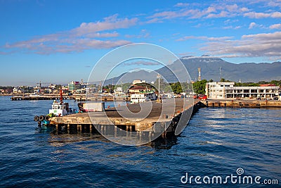 Dumaguete, the Philippines - 10 Mar 2020: empty port pier of small town. Tropical island hopping cruise Editorial Stock Photo