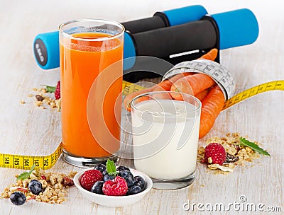 Dumbbells and healthy fresh food - health and diet concept Stock Photo