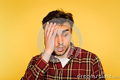 Dumbfounded shocked man clutch head dismay emotion Stock Photo