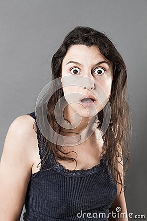 Dumbstruck woman expressing jaw dropping surprise Stock Photo