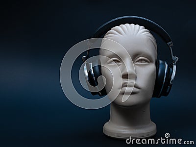 Dummy mannequin head with over ear headphones Stock Photo