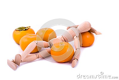 Dummy and ripe persimmon Stock Photo