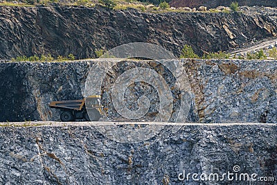 Dump truck in limestone mining, heavy machinery. Mining in the quarry Stock Photo