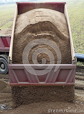 Dump Truck Unloading Stock Photo