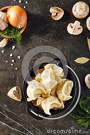 Dumplings Jiaozi, Dimsum, Momo or Ha Gao on Dark Background Stock Photo