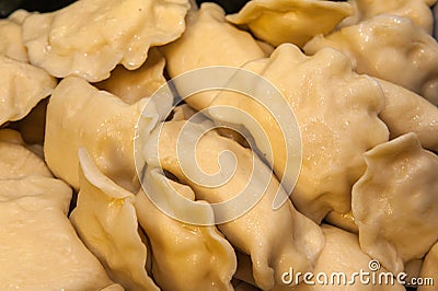 Dumplings stuffed with cheese and potatoes Stock Photo