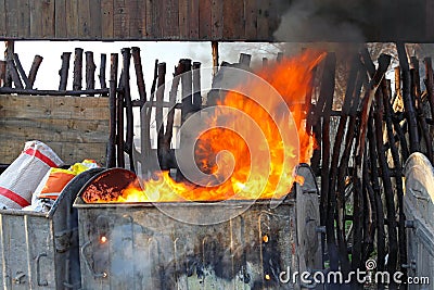 Dumpster fire Stock Photo