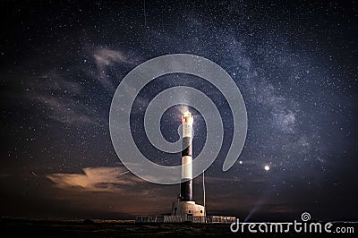 Dungeness Lighthouse at night Stock Photo