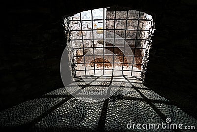 Dungeon old dark prison medieval cell bars Stock Photo