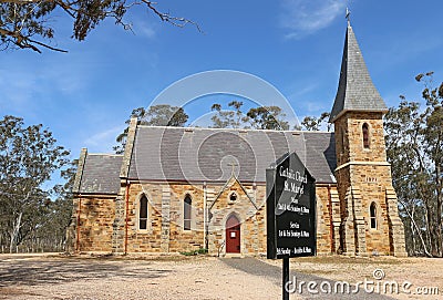 Dunolly's St Mary's Catholic church (1871), a Gothic Revival building made of sandstone and granite Editorial Stock Photo