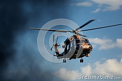 Duo of military choppers soar, dazzling in vibrant air spectacle Stock Photo