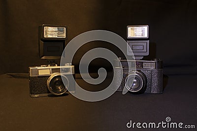 Duo of vintage analog cameras and their two flaxex Stock Photo