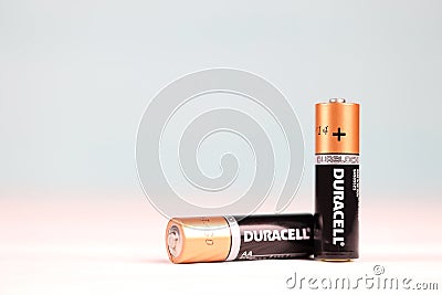 Duracell batteries on white background. Duracell is an American brand of batteries and smart power solutions manufactured by Editorial Stock Photo