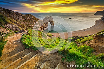 Durdle Door at the beach on the Jurassic Coast of Dorset at sunset, UK Stock Photo