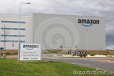Amazon warehouse for shipping of online purchases. Exterior of building showing sign Editorial Stock Photo
