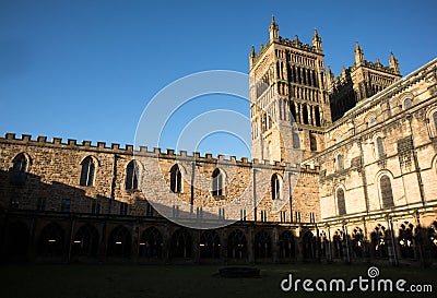 Medieval stone cathedral with cloisters. Exterior facade view. Durham Cathedral World Heritage Site Editorial Stock Photo