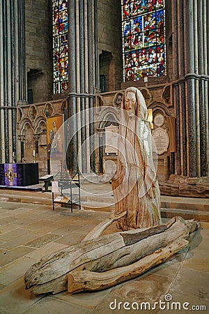 Durham, UK - July 12, 2023: The Pieta, a wooden sculpture of the Christ and mother Mary. Durham Cathedral, England Editorial Stock Photo