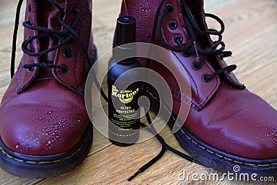 Branded Dr Martens shoe care protector kit. Leather wax and all weather protection spray. Editorial Stock Photo