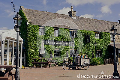 Durham UK: may 2022: South Causey Inn pub restaurant exterior covered in green ivy on sunny summer day Editorial Stock Photo