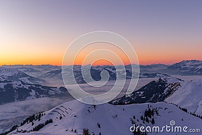 Sunset at Austrian Mountain Range in Winter Stock Photo