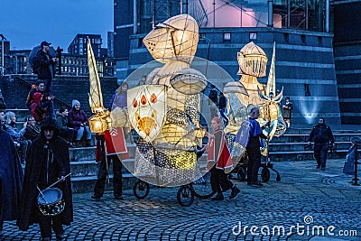 At Dusk, Giant illuminated knights Perform at a Live Public Event. Editorial Stock Photo