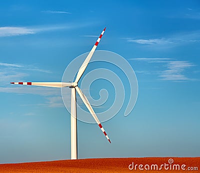 Dusk skies over windmill turbines Stock Photo