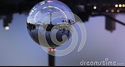 Night View Crystal Glass Ball Travel around the World - TV Tower Harbor Rhine River Promenade in Dusseldorf Germany Stock Photo