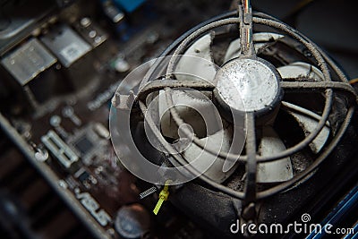Dust on computer pc processor cooler with mainboard and computer case fragment Stock Photo