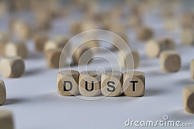 Dust - cube with letters, sign with wooden cubes Stock Photo