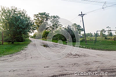 Dust road in Colonia Pellegrini Stock Photo