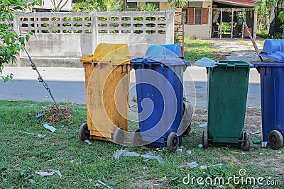 Dustbins in the colors blue, yellow. recycling of large bins Stock Photo