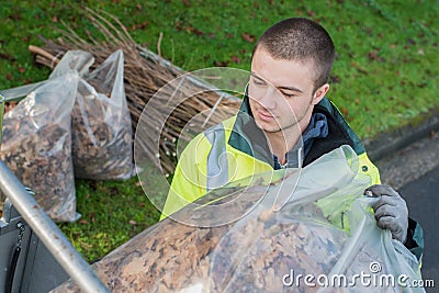 Dustman cleans the street Stock Photo