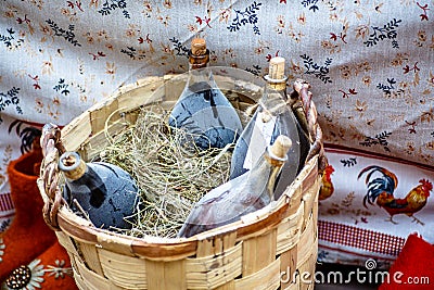 Dusty bottles of homemade wine Stock Photo