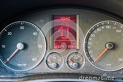 Dusty car dashboard panel with speedometer and, open door indicator isolated Editorial Stock Photo