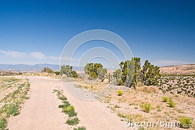 Dusty high desert road Stock Photo