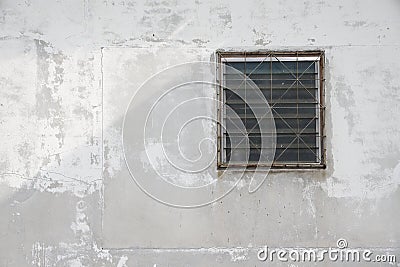 dusty white ancient building facade with glass louver windows Stock Photo