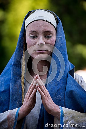 The weeping Madonna. Dutch artist performing during the International Festival of Living Statues, Bucharest, Romania, June 2017 Editorial Stock Photo