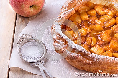 Dutch baby pancake with apple. Stock Photo