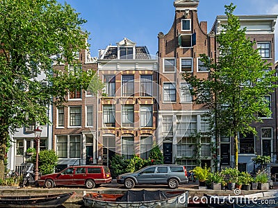 Dutch canal houses in Amsterdam during the day Editorial Stock Photo